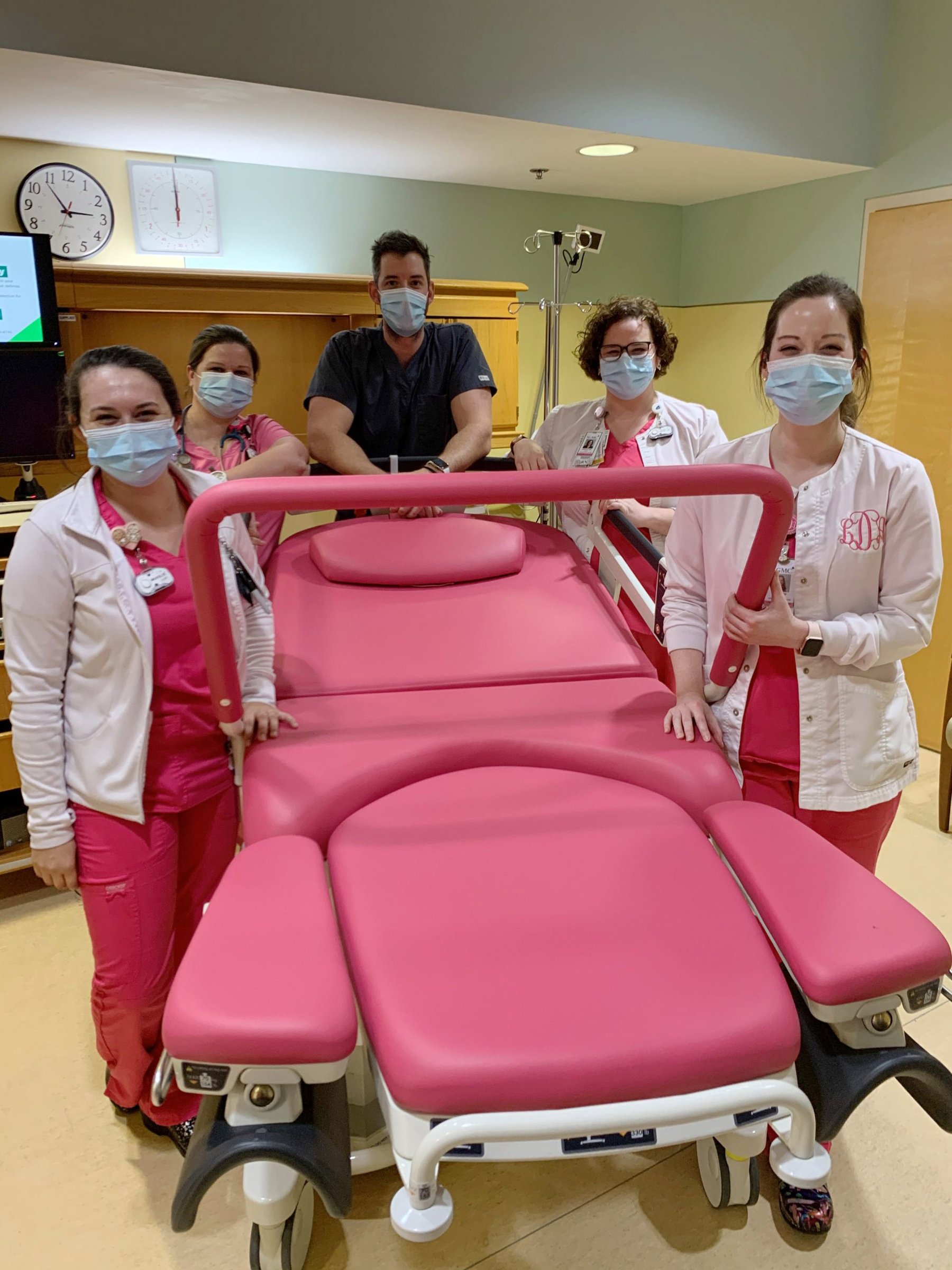 SGMC delivery team with new birthing bed for mothers